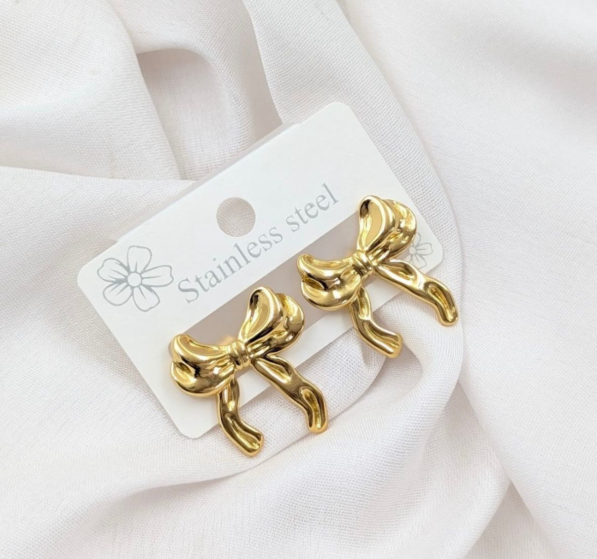Golden Bow Knot Stainless Steel Earrings – Elegant & Stylish