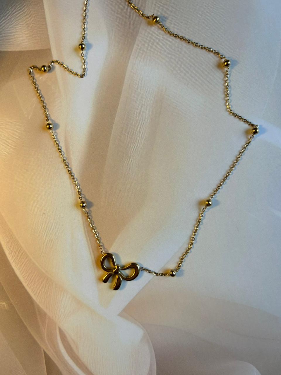 ✨ Elegant Golden Bow Pendant Necklace – Minimal & Chic Design