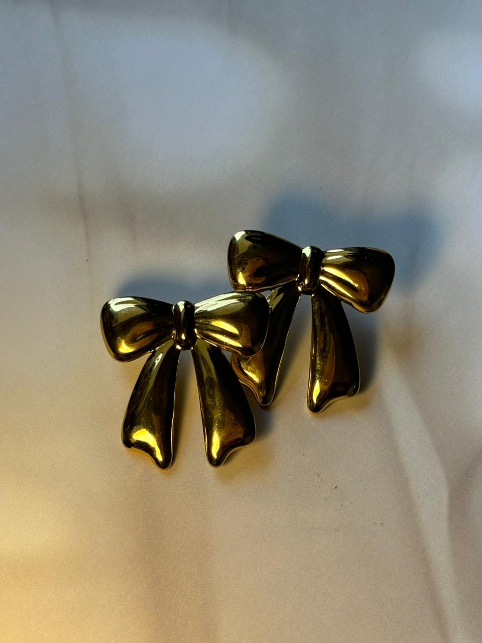 Golden Bow Knot Stainless Steel Earrings – Elegant & Stylish