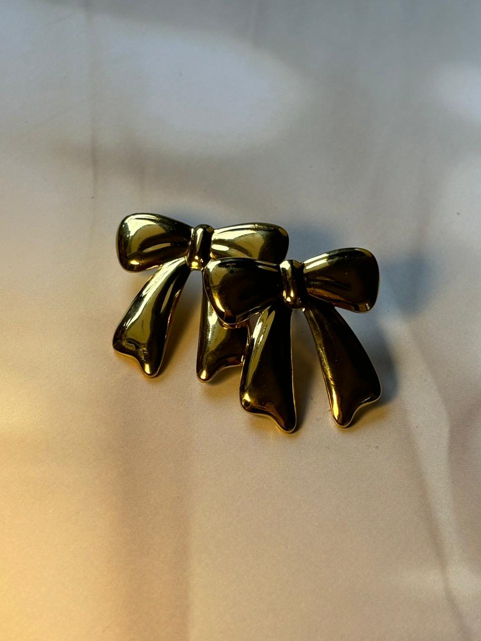 Golden Bow Knot Stainless Steel Earrings – Elegant & Stylish